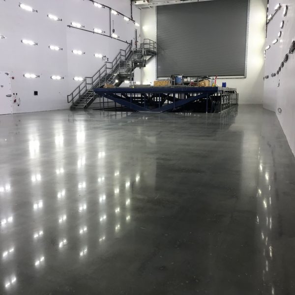 34,000 sq ft airplane hanger, polished with Tennant ReVue Polish System.